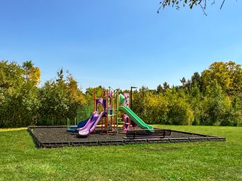 Kid playground at three oaks apartments in troy, mi.